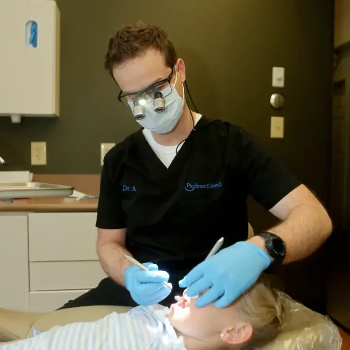 Dr. Areheart treating a patient at Piedmont Dental Rock Hill SC